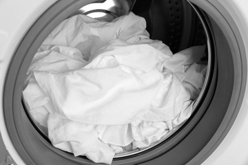 Washing machine and clothes, close up