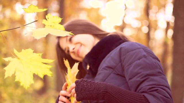 Autumn. Happy Couple Having Fun Outdoors. Fall. HD 1080p video footage, high speed camera 240 fps, slow motion