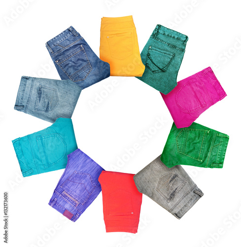 "Collection of folded multicolored jeans isolated on white" Stock photo