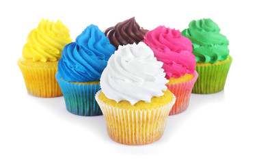 Fresh tasty cupcakes on white background