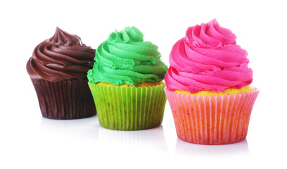 Fresh tasty cupcakes on white background