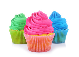 Fresh tasty cupcakes on white background
