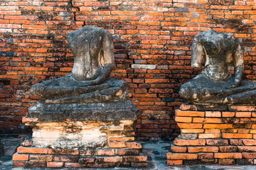 Broken buddha statue, taken outdooor in afternoon