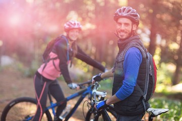 Obraz premium Biker couple standing together