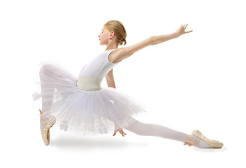 Young beautiful ballerina dancer on light background