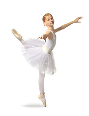 Obraz premium Young beautiful ballerina dancer posing on light background