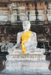 Broken buddha statue, taken outdooor in afternoon