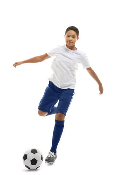 African American boy playing football on white background