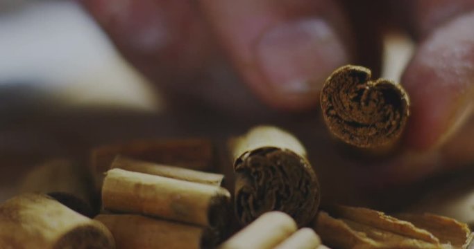 HTML5 Video is required for viewing the video 	Super slow motion macro of a middle aged chef taking cinnamon stick for a dish preparation (extra close up)