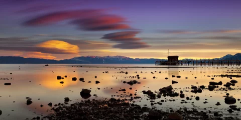 Crédence de cuisine en verre imprimé Lac / étang Pier in Tahoe City, California in Lake Tahoe at sunset with vivid clouds