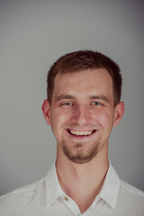 Obraz premium Portrait of a smiling young man