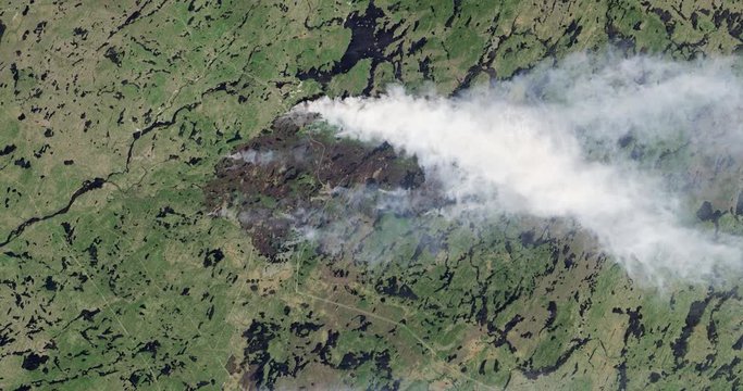 Aerial zoom out over the 2013 fires in western Quebec, Canada. Data: USGS/NASA Landsat.