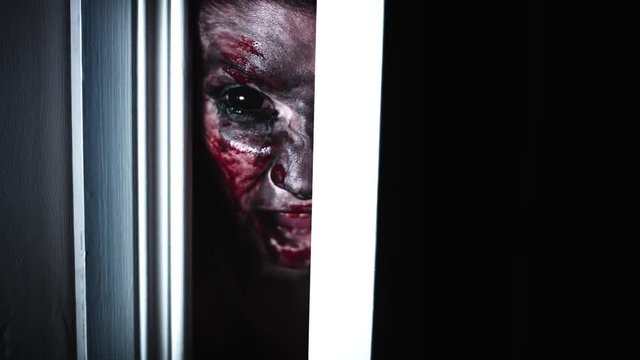 4K Horror Bloody Scary Woman Eye Looking in Door Gap and Shouting