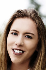 Naklejka premium Teen Caucasian Woman Outdoor Smiling Portrait Closeup
