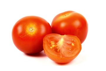 Ripe cherry tomatoes close-up on a white background