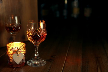 Valentines Day Romantic Drinks by candle light with copy space for text