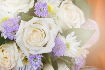 Close up bouquet of mixed flowers with sunlight effect