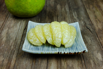 Green pomelo fruit.