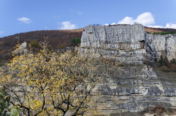 Fototapeta na wymiar Red wooden climber house in the Lakatnik rocks, Iskar river defile, Sofia province, Bulgaria 