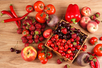 Set of red fresh raw vegetables and fruits