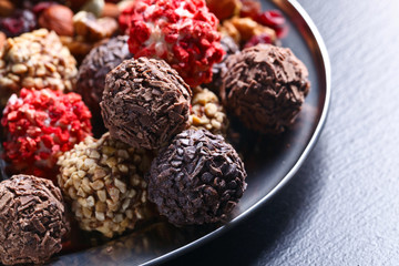 Homemade candy with chocolate , nuts and dried strawberry