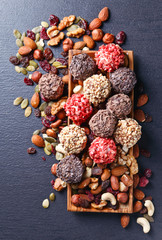 Homemade candy with chocolate , nuts and dried strawberry