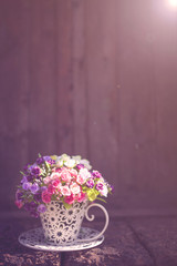 Abstract blurred vintage background of flower vase with morning sunlight, valentine concept