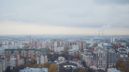 Russian industrial district - aerial panorama of autumn city in cloudy sky