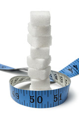 Measuring tape around sugar cubes