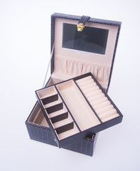 jewelry box or leather jewelery box on background.