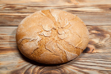 Bread on a rustic wooden background