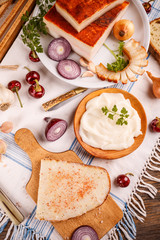 A slice of bread spread with lard was a typical staple in traditional rural cuisine of many countries