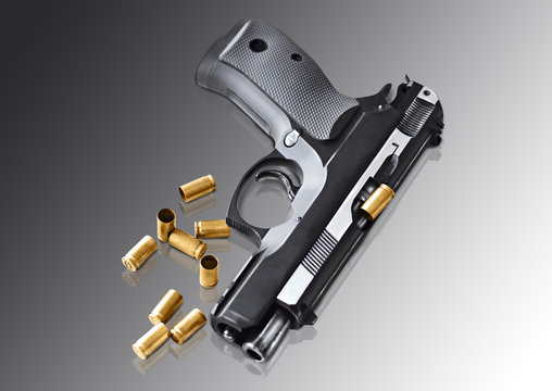 real hand gun pistole 9mm isolated
