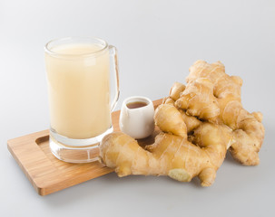 Ginger tea or Ginger tea with haney on background.