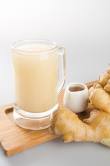 Ginger tea or Ginger tea with haney on background.