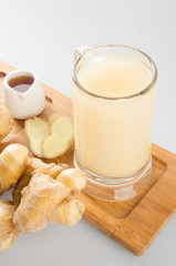 Ginger tea or Ginger tea with haney on background.
