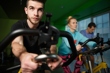 Young sportsmens practiced on simulators