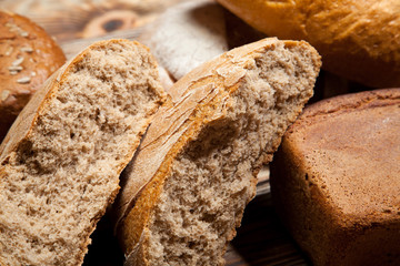 Bread on a rustic wooden background