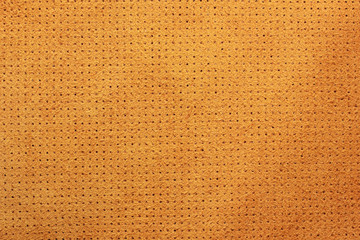 Yellow velvet perforated leather texture background