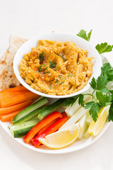 traditional sauce hummus with fresh vegetables and pita bread