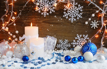Obraz na płótnie Canvas Christmas candles with Christmas ornaments and Christmas lights.