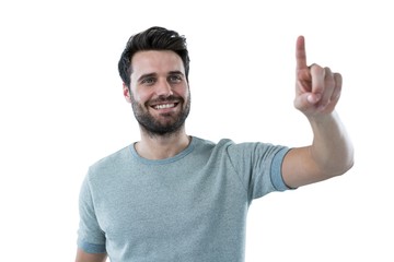 Smiling man pretending to touch an invisible screen - Powered by Adobe