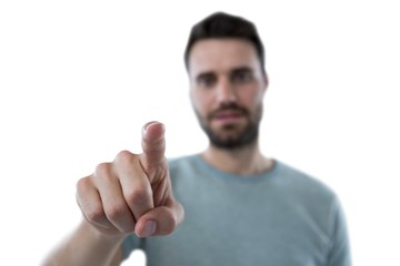 Man pretending to touch an invisible screen