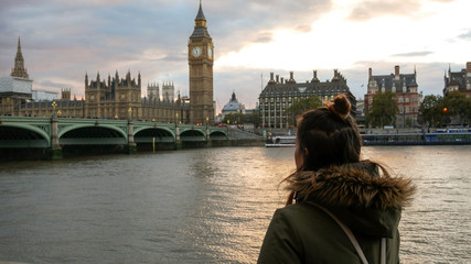 Woman looking at Westminster palace
