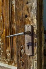Detail of an old door whit a lock