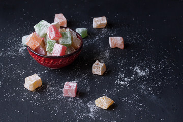 Turkish delight lokum on a black background