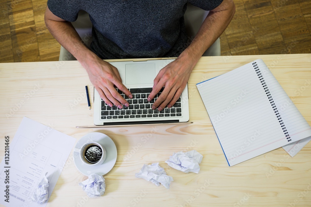 Aufkleber graphic designer using digital tablet at his desk