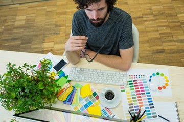 Graphic designers work desk in office