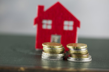 House on money pillars