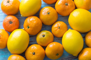 Lemons Tangerines on a blue background